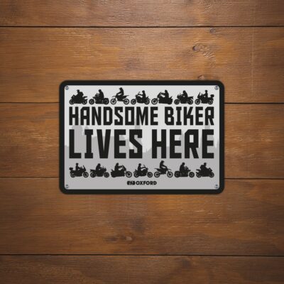 Oxford Garage Metal Sign: Handsome Biker Lives Here